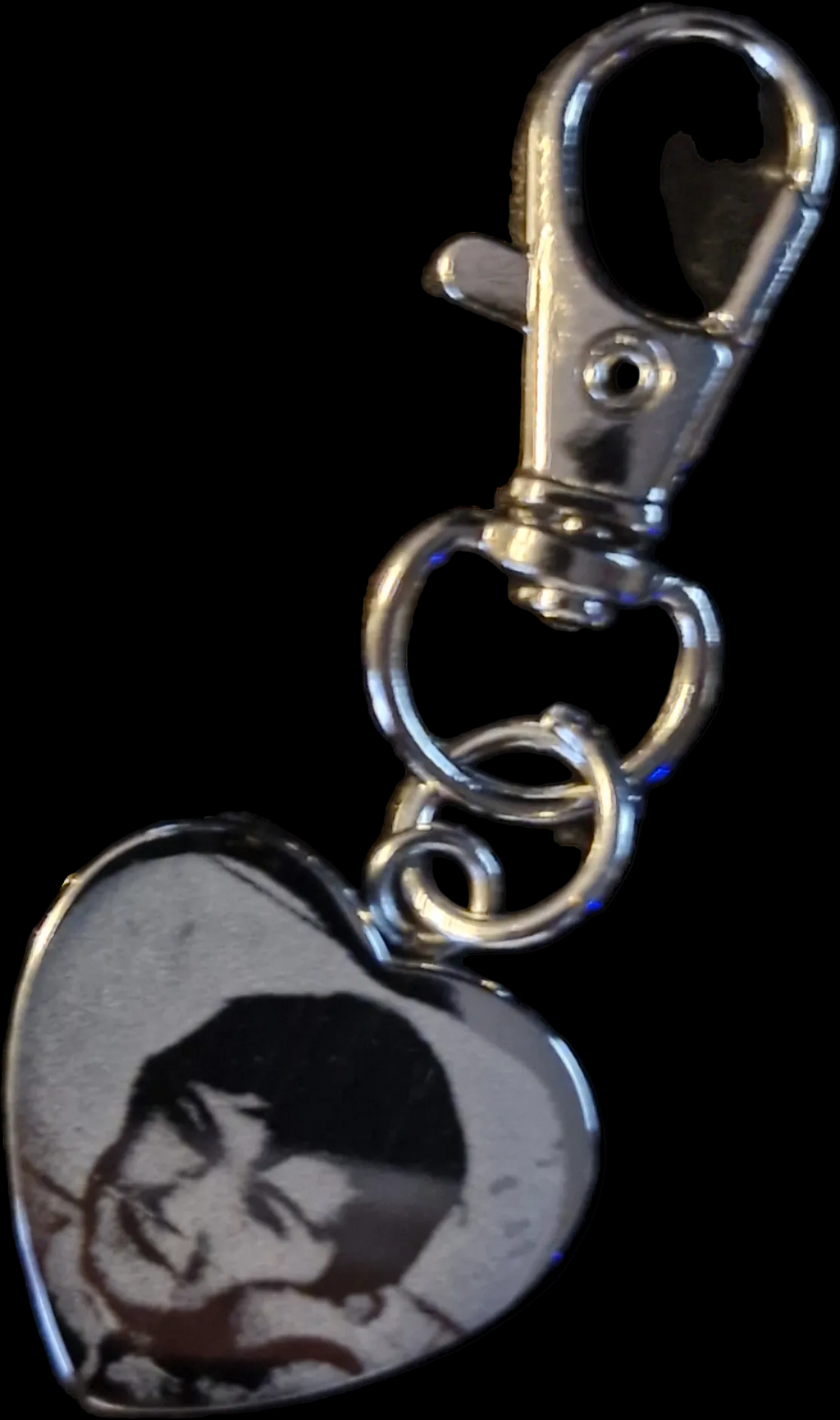 Engraved stainless steel Heart with photo. 
Both sides are engravable.