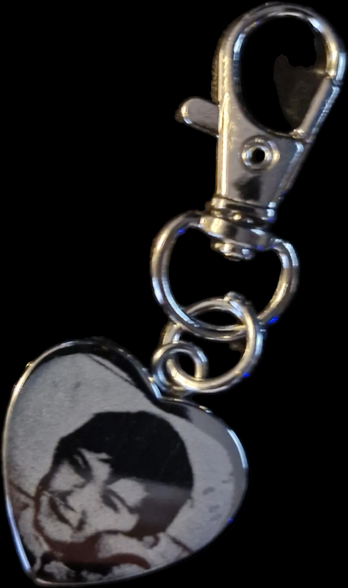 Engraved stainless steel Heart with photo. 
Both sides are engravable.